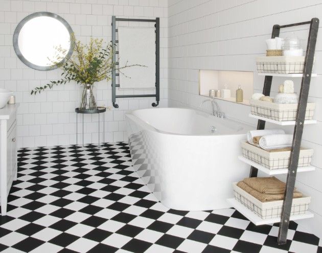 Stylish bathroom with black and white floor tiles copy