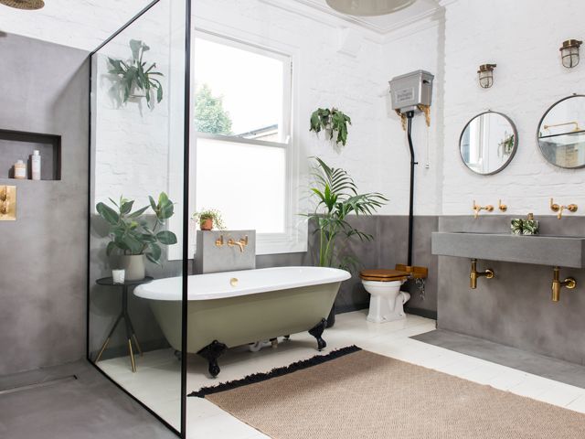 Harding bathroom after makeover with concrete surround, shower and double sink with brass fixtures and fittings