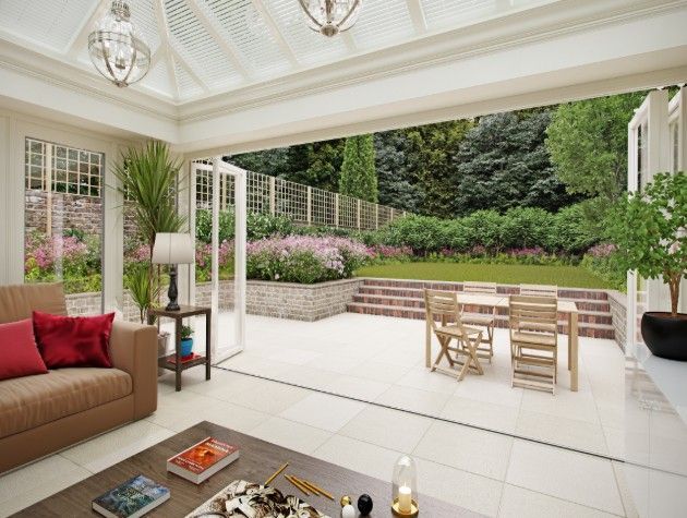 Bifold doors thrown open between a living area and patio