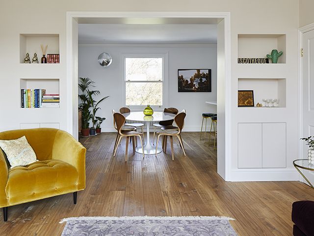 modern london home with real wood flooring in dining room and living room - goodhomesmagazine.com