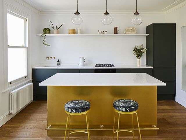 London kitchen with brass island - home tour - goodhomesmagazine.com
