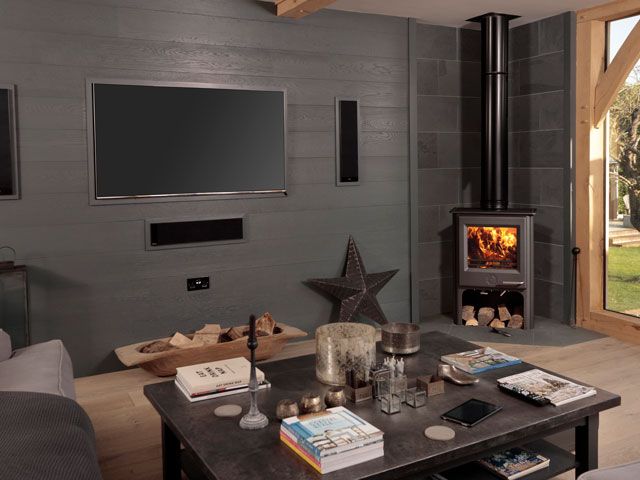 Woodwarm Phoenix Eco Design Fireblaze Convector by woodwarm stoves in a living room