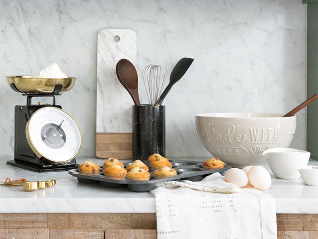 Amara black and brass kitchen scales with mixing bowl and utensils - goodhomesmagazine.com