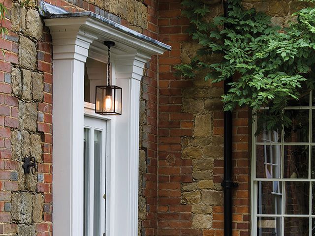 period property front door with hanging pendant light and drain pipe - garden - goodhomesmagazine.com
