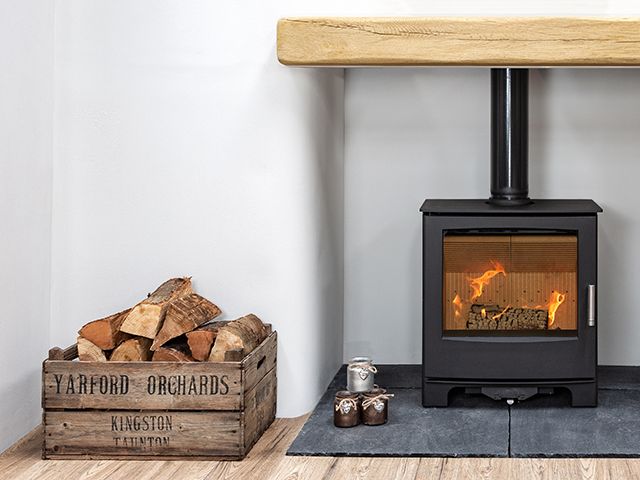 mendip stove with wood store for burning - living room - goodhomesmagazine.com