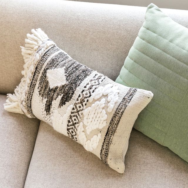 Diamond Fringed Cushion in Natural/Grey, £30 | Credit: Amara | Goodhomesmagazine.com