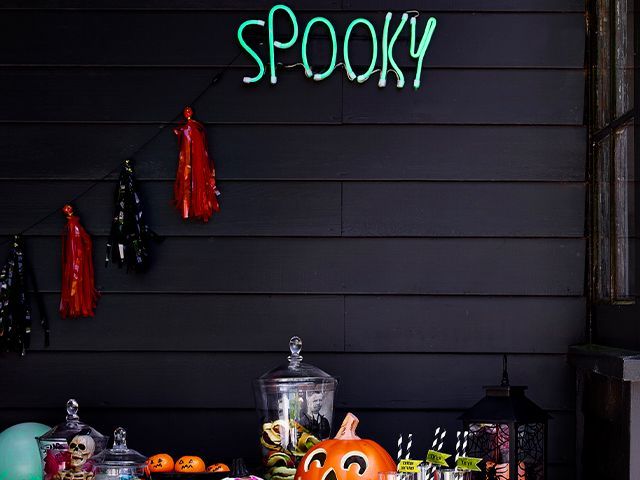 spooky light sainsburys - 7 quirky halloween decorating ideas - inspiration - goodhomesmagazine.com