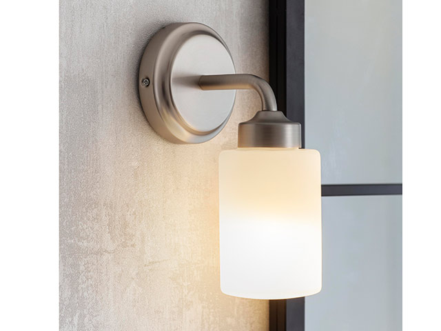 Satin nickel frosted bathroom lights with ambient lighting