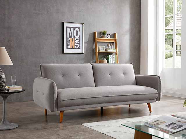 Grey pin cushion sofa with oak wooden legs, goodhomesmagazine.com