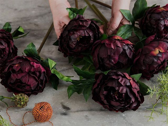 abigail ahern faux peony plum flowers for halloween decorating - inspiration - goodhomesmagazine.com