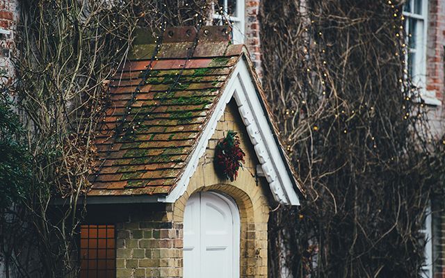annie spratt for unsplash british house with christmas wreath - news - goodhomesmagazine.com