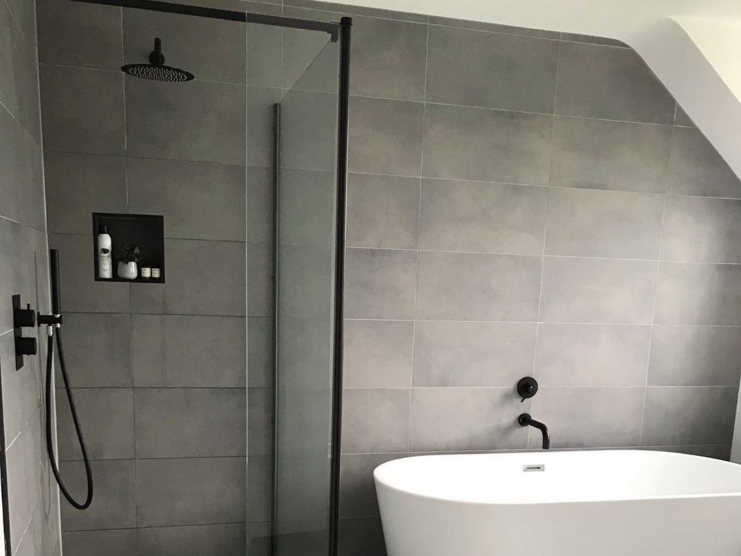 black shower, screen and bath filer in modern bathroom @blathtinn - goodhomesmagazine.com