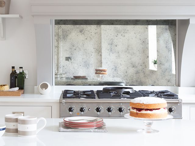 Antiqued glass splashback from Humphrey Munson kitchen 