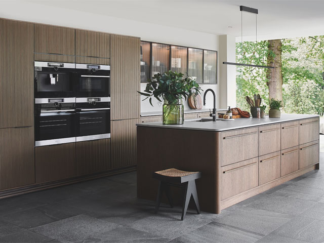 kitchen trends: dark wood cabinets with textured finish