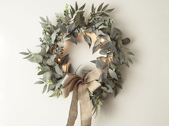 lights4fun soft green eucalyptus wreath - best fake wreaths - goodhomesmagazine.com