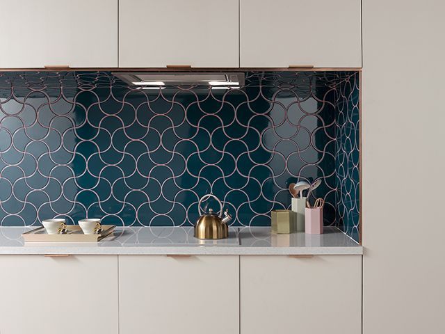 Kitchen with interlinked fishscale syren tiles from topps tiles as splashback - inspiration - goodhomesmagazine.com