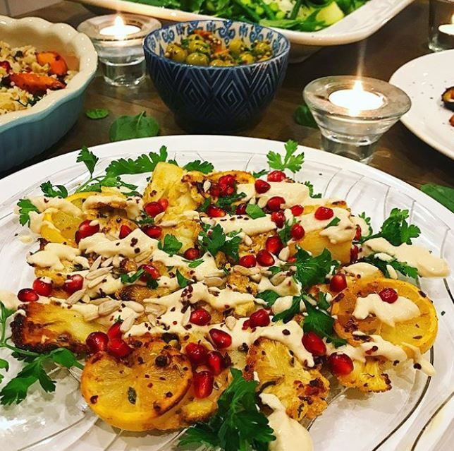 Roasted cauliflower with lemony tahini dressing and pomegranate