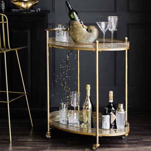 antique-style drinks trolley with gold metal trim from Rockett St George