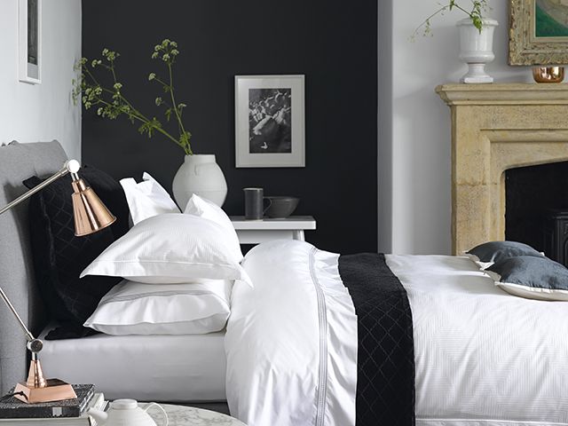 christy engima bedding in light bedroom - goodhomesmagazine.com