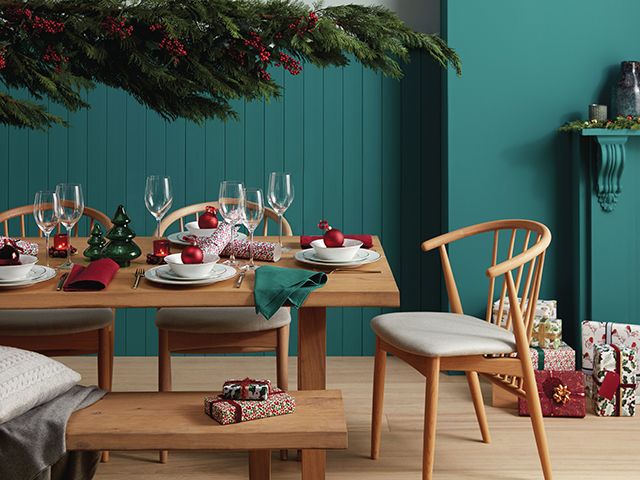 winter dining table with branch hanging john lewis & partners - christmas - goodhomesmagazine.com