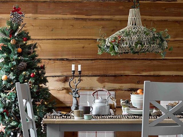 oak furnitureland christmas dining table with festive lighting - goodhomesmagazine.com