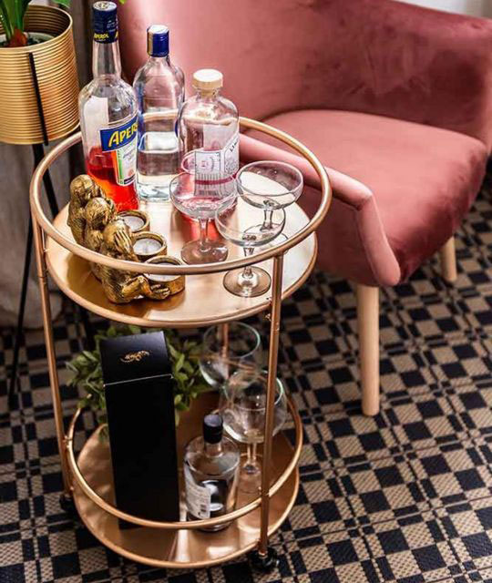 rose gold drinks trolley with two metal shelves from Sue Ryder