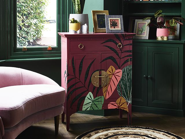 oliver bonas hand painted cabinet with palm pattern - goodhomesmagazine.com