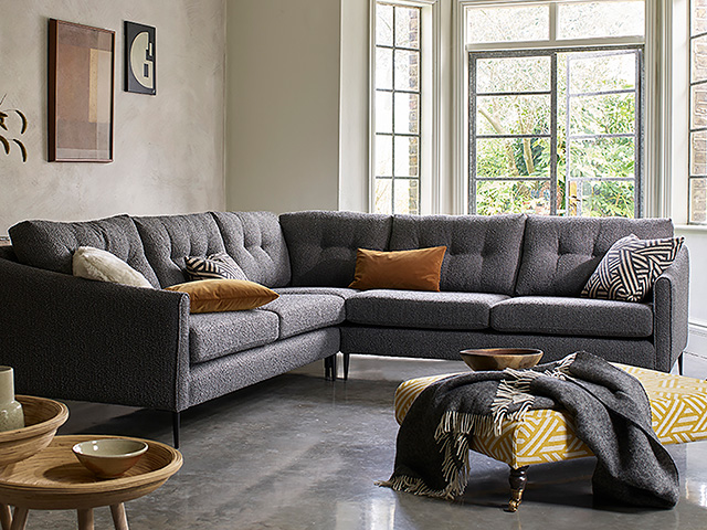 grey sofa with accent yellow footstool - pantone colour of the year - goodhomesmagazine.com