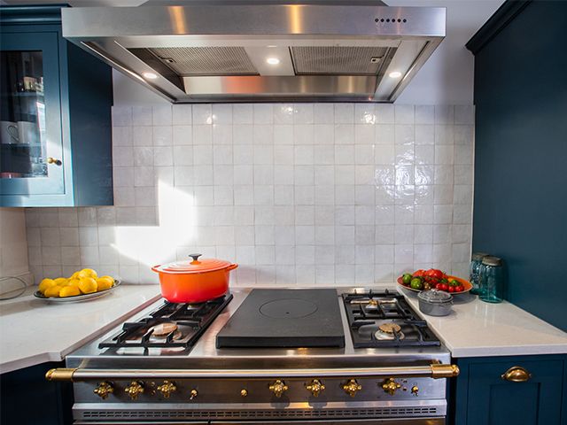 jun oven shot - take a look at this Michelin stars chef navy blue kitchen - kitchen - goodhomesmagazine.com