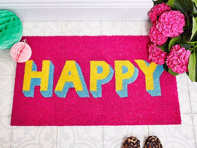 happy doormat from red candy - goodhomesmagazine.com