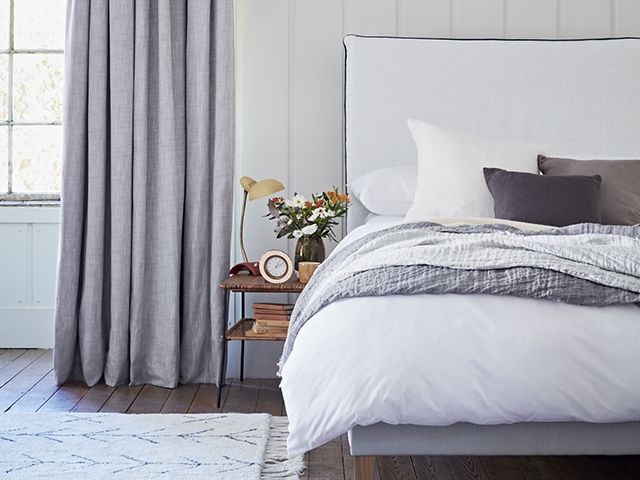 LoomLast pair of Kolala curtains in white bedroom - goodhomesmagazine.com
