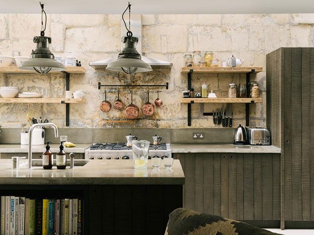 rustic sebastian cox kitchen from devol with timber cladding and stone effect walls