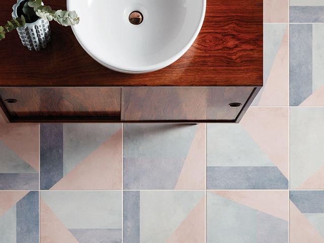 ted baker pastel luxury tiles in bathroom paired with midcentury modern bathroom cabinet