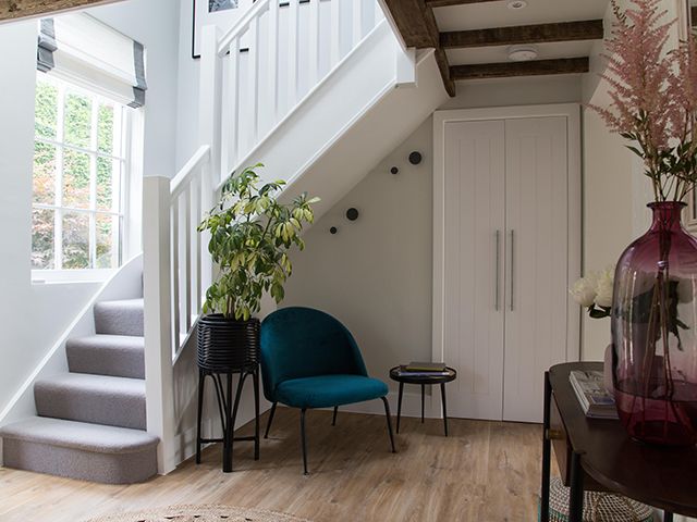 cult furniture hallway with chair and stairs - goodhomesmagazine.com