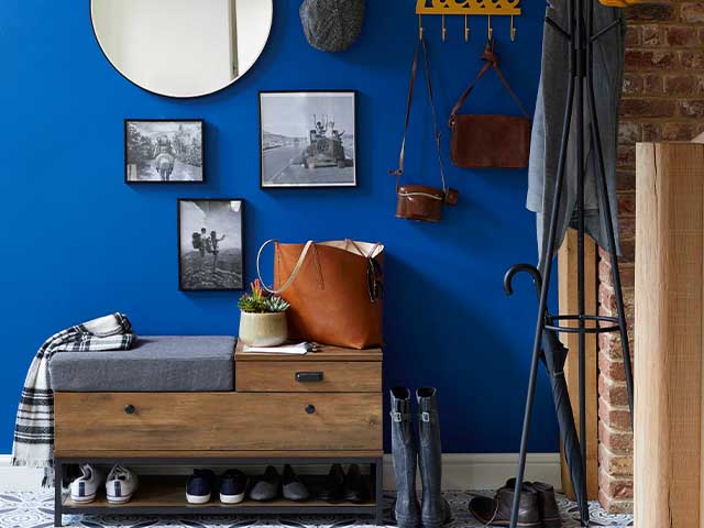 dunelm blue hallway gallery wall - budget hallway updates we love - hallway - goodhomesmagazine.com