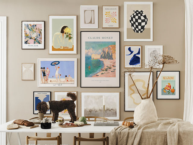 Desenio gallery wall featuring Monet, pastels and prints