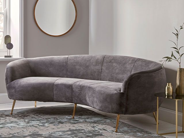 grey velvet curved art deco sofa - top spring summer trends for 2020 - inspiration - goodhomesmagazine.com