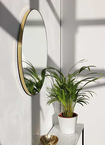 round gold hallway mirror - budget hallway updates we love - hallway - goodhomesmagazine.com