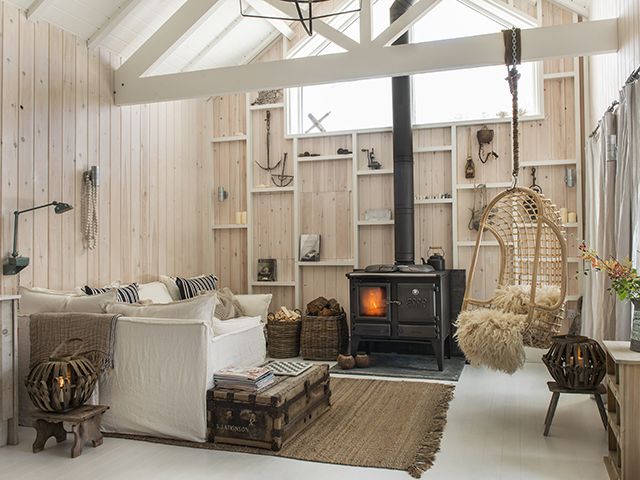 stanley rustic cabin style wood house - living room - goodhomesmagazine.com