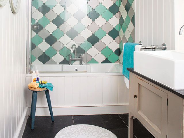 country style bathroom with colourful tiles - goodhomesmagazine.com