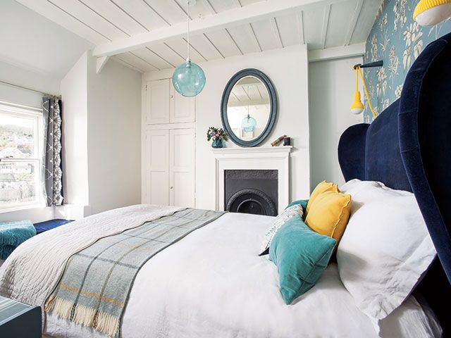 blue and yellow bedroom scheme in old cottage - goodhomesmagazine.com