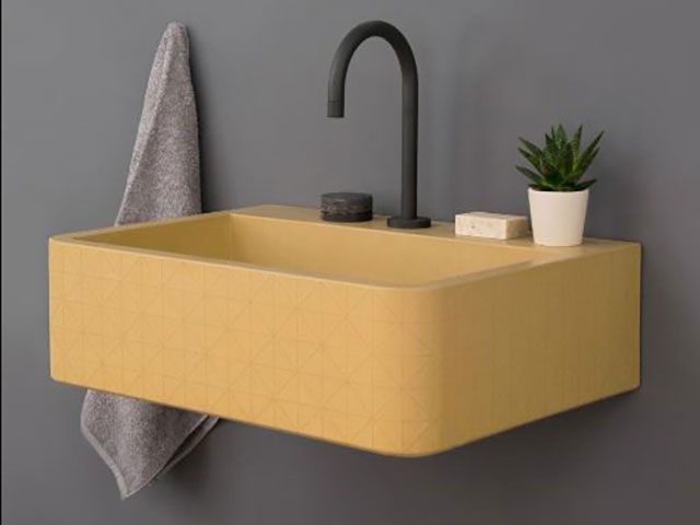 concrete basin sink in yellow - goodhomesmagazine.com