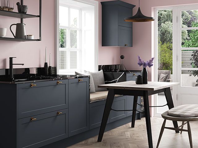 pink and midnight blue kitchen with seating nook from Benchmarx Kitchens - goodhomesmagazine.com