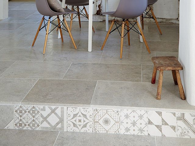 country kitchen with accent pattern tile step - goodhomesmagazine.com