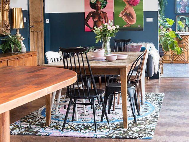 mixed chairs round table in colourful dining room - goodhomesmagazine.com