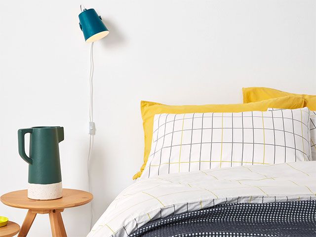 wall mounted light next to bed - goodhomesmagazine.com