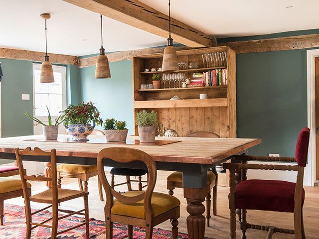 traditional style dining room with mixed chairs - goodhomesmagazine.com