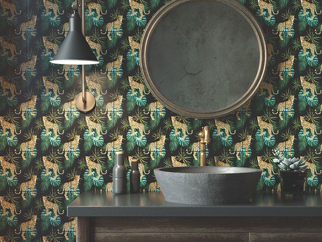 bathroom with leopard pattern tiles - goodhomesmagazine.com