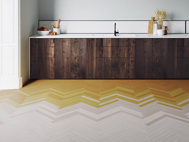 modern kitchen with ombre herringbone floor tiles - goodhomesmagazine.com