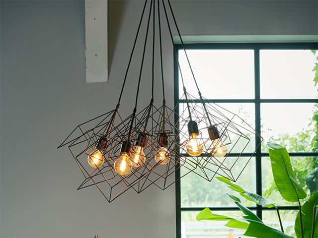 black caged chandelier - 5 chandeliers to suit every interior style - shopping - goodhomesmagazine.com